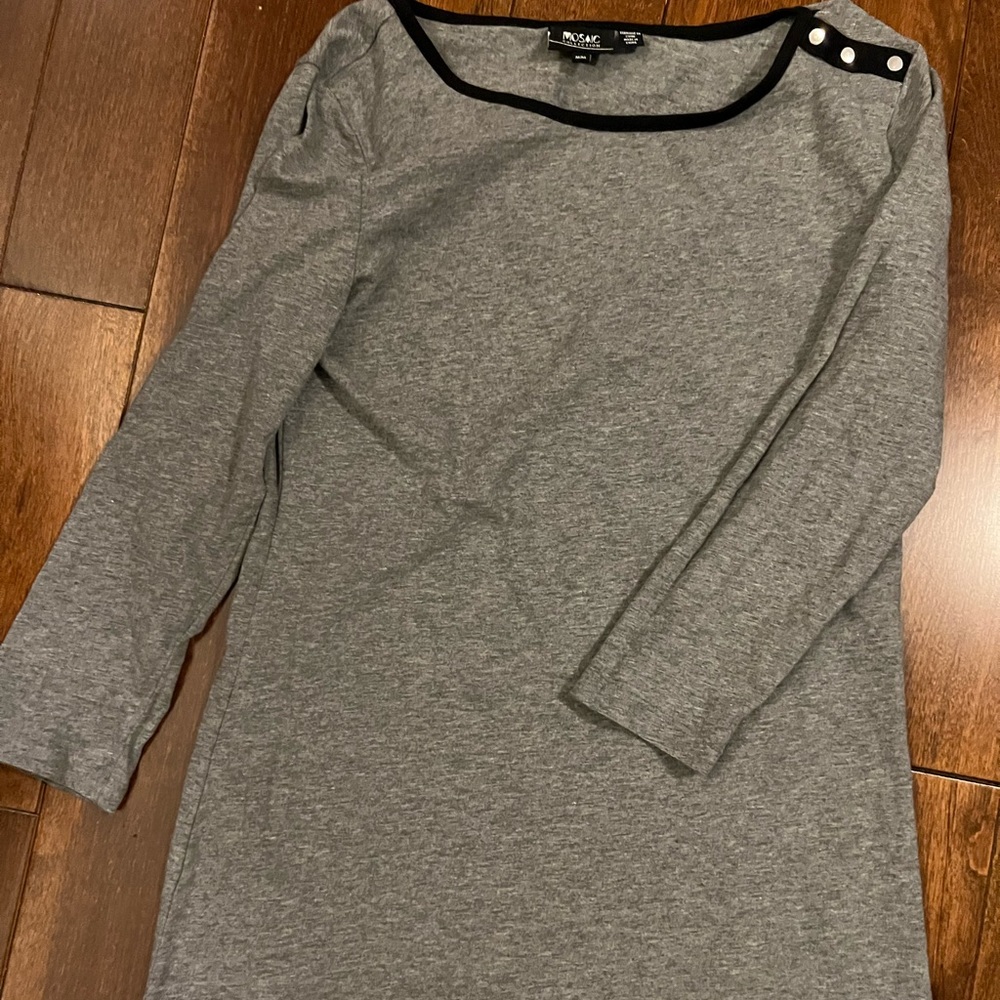 Brand new long sleeves shirt with buttons on right side of the shoulder